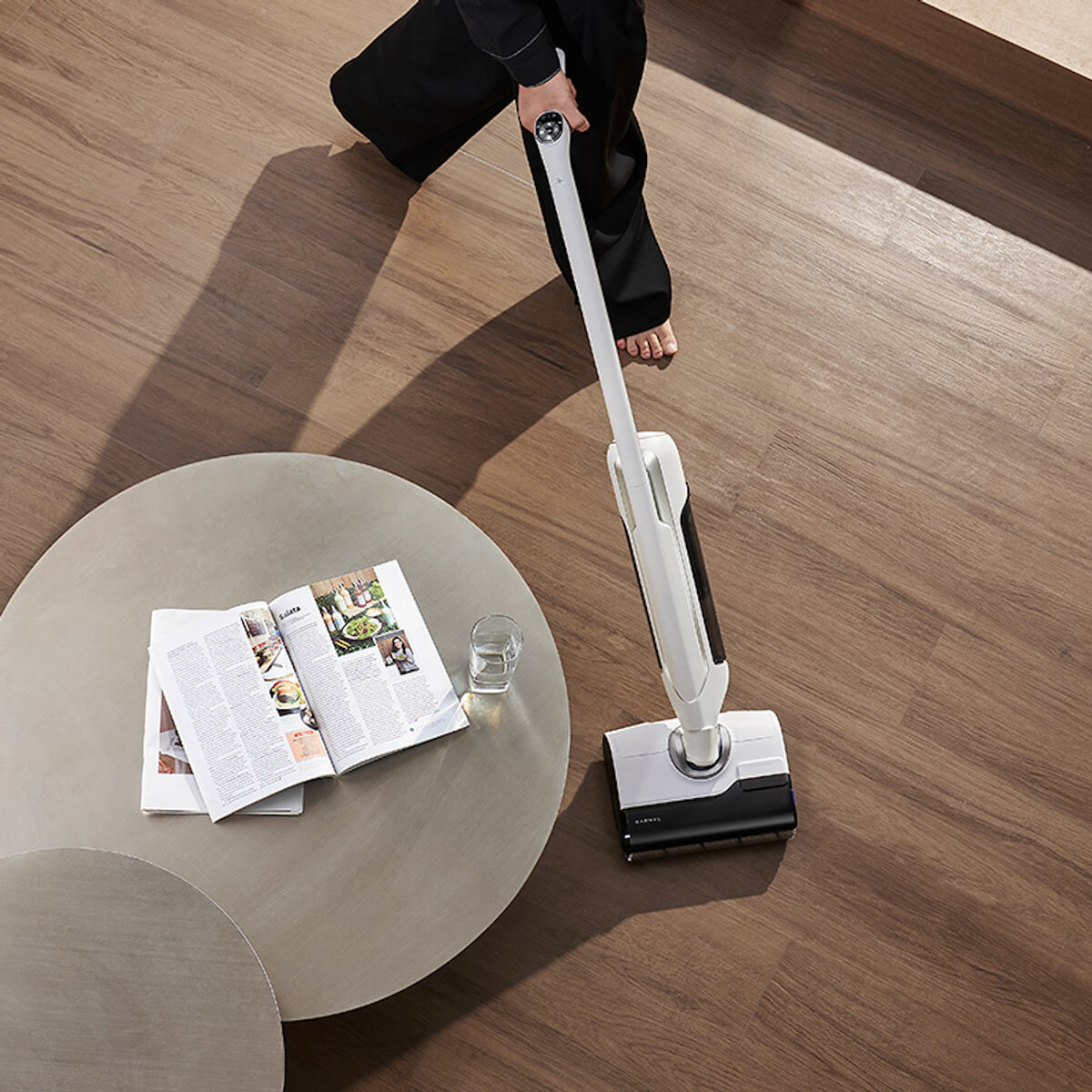Lifestyle image of Narwal S20 Wet & Dry Vacuum Cleaner being used in a living roomimages