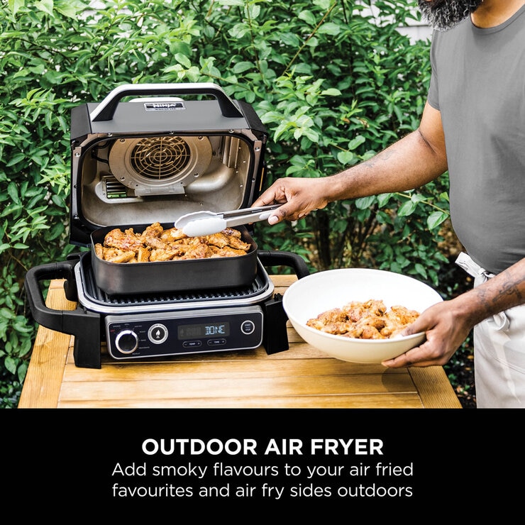 Lifestyle image showing grill being used outdoorimages Lifestyle image showing grill being used outdoorimages