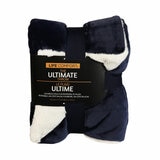 Life Comfort reversible throw in navy faux fur with white plush lining