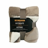 Life Comfort reversible throw in Taupe faux fur with white plush lining
