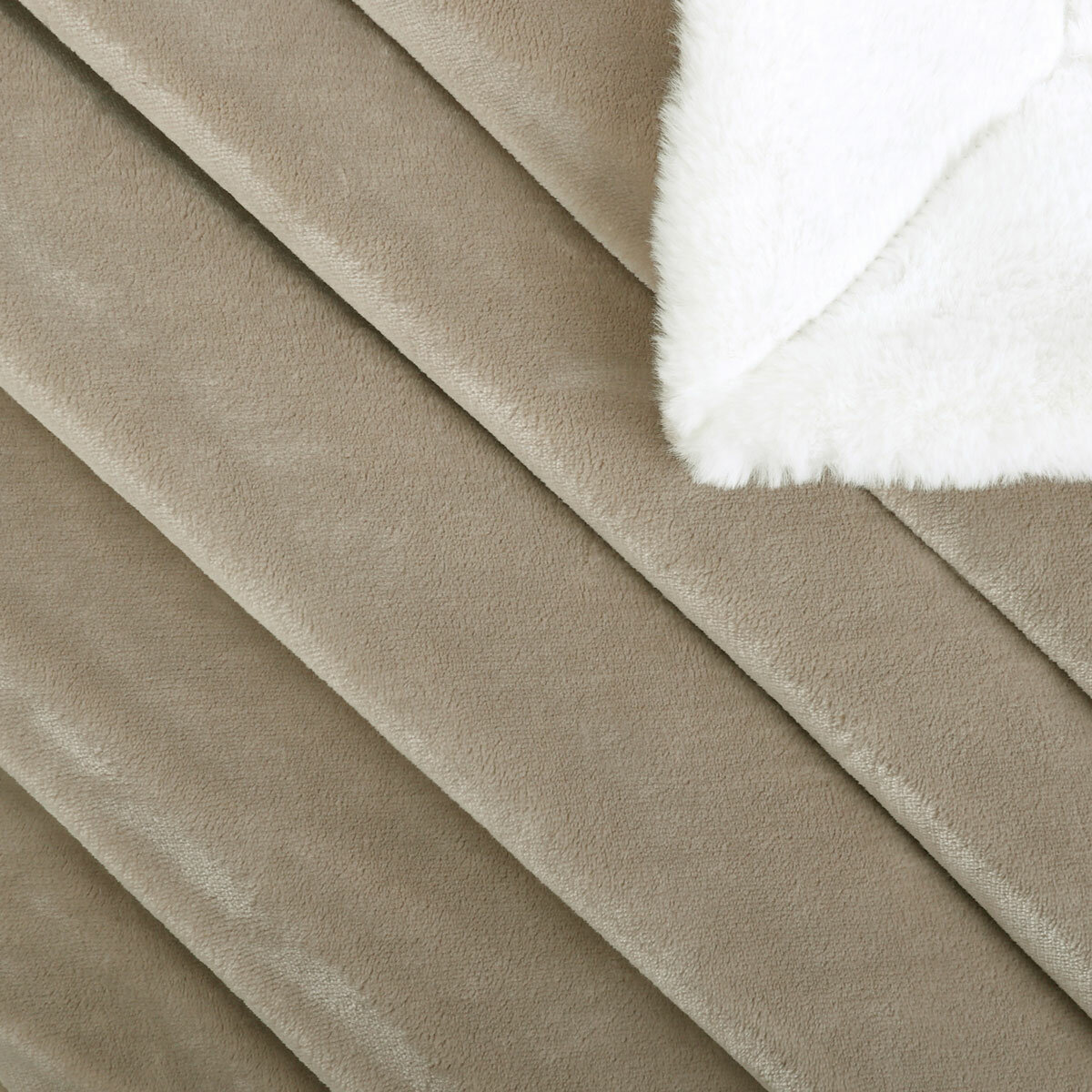 Detail of Taupe ridged blanket with white sherpa lining