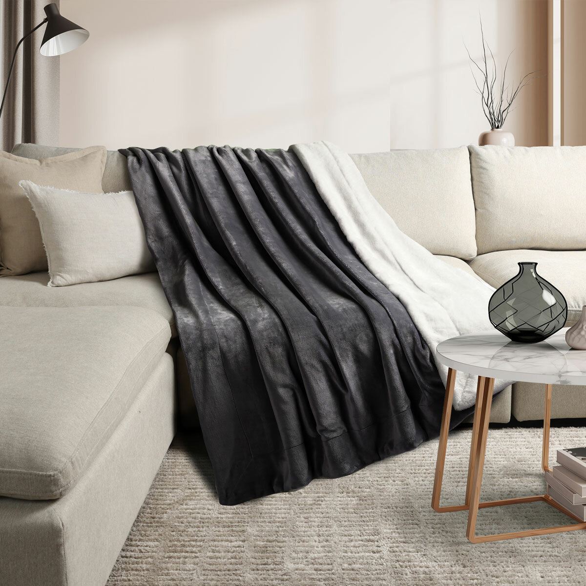 Life Comfort reversible throw in dark grey faux fur with white plush lining