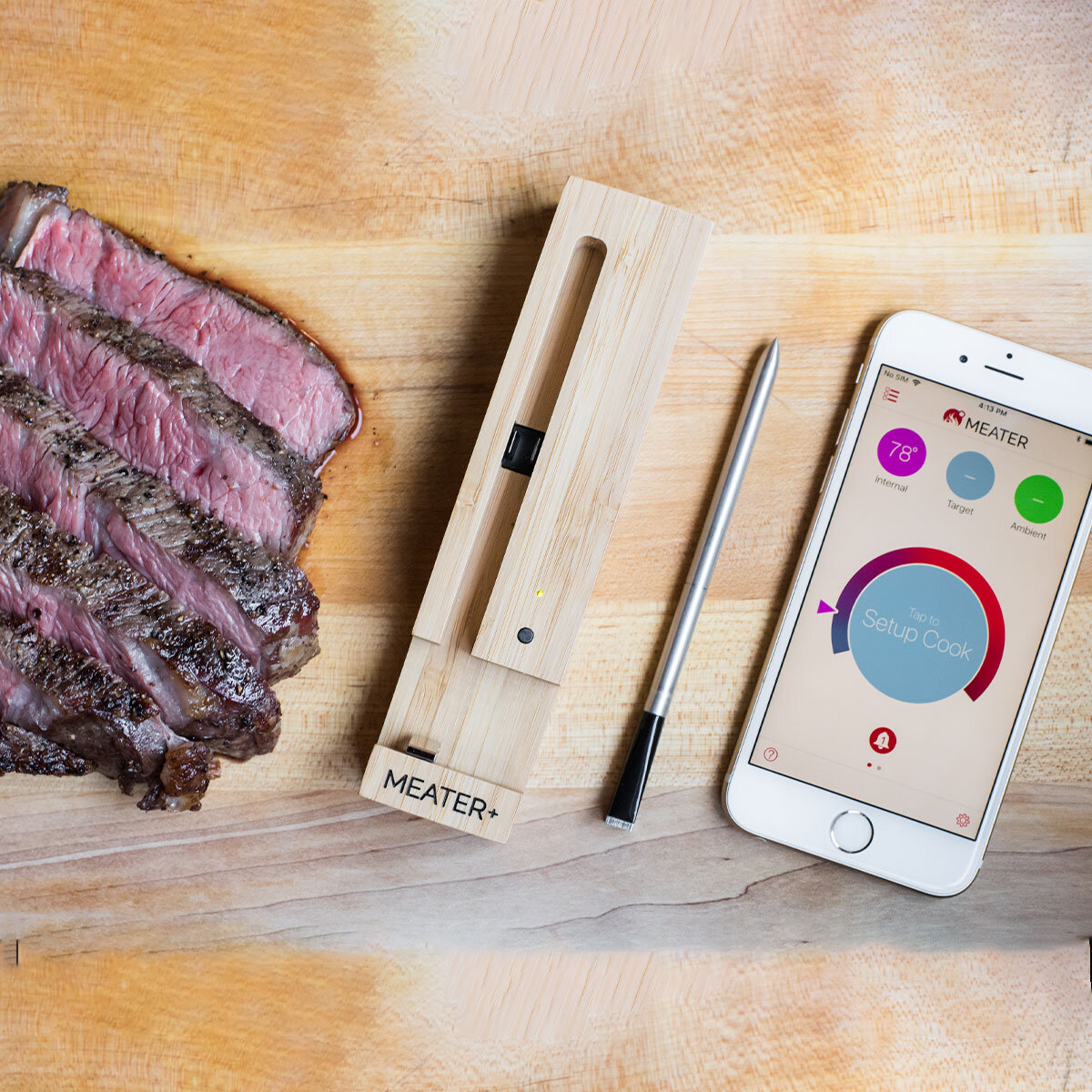 Meater Thermometer with cooked steak