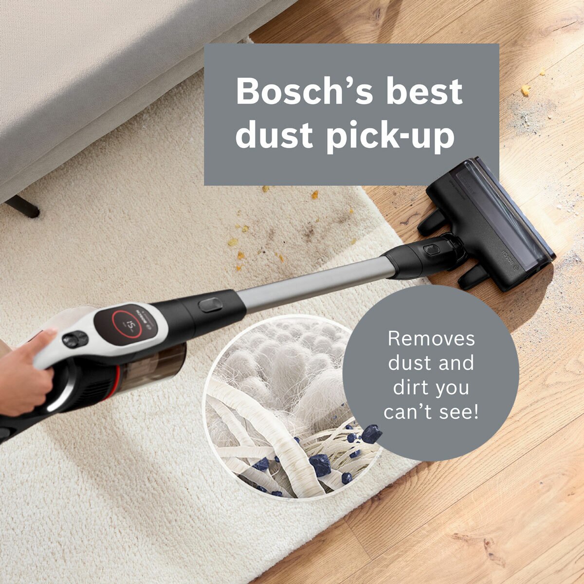 Lifestyle image of vacuum picking up dust