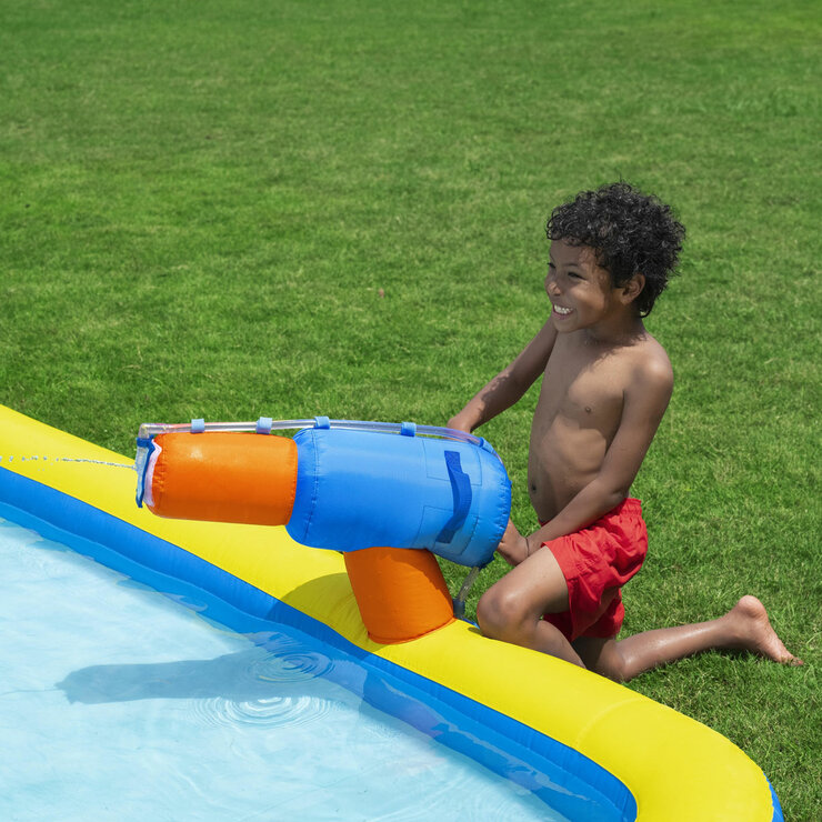 Lifestyle image of a child using the water cannon