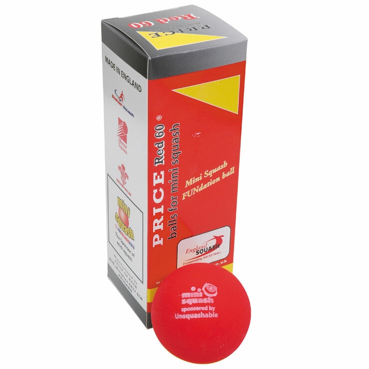 Studio image showing the included squash balls