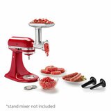 Lifestyle image of KitchenAid Metal Food Grinder attachment attached to the stand mixer