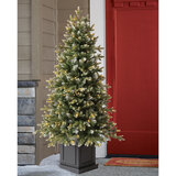 Buy 4.5' Pre-Lit Potted Tree Lifestyle1 Image at Costco.co.uk