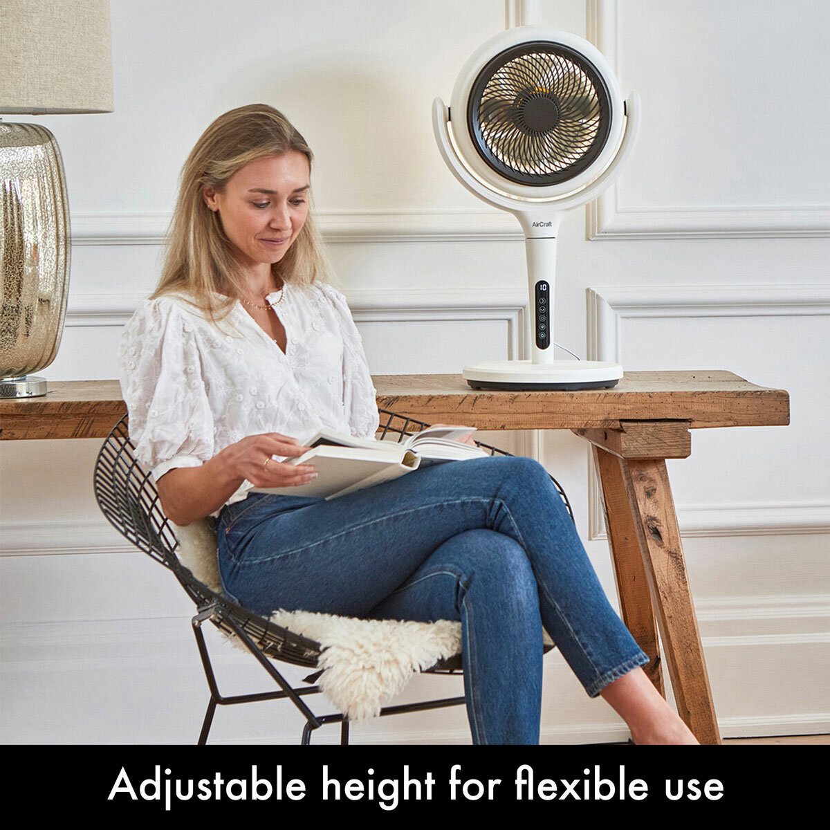 Lifestyle image of  the fan with adjustable height for flexible use