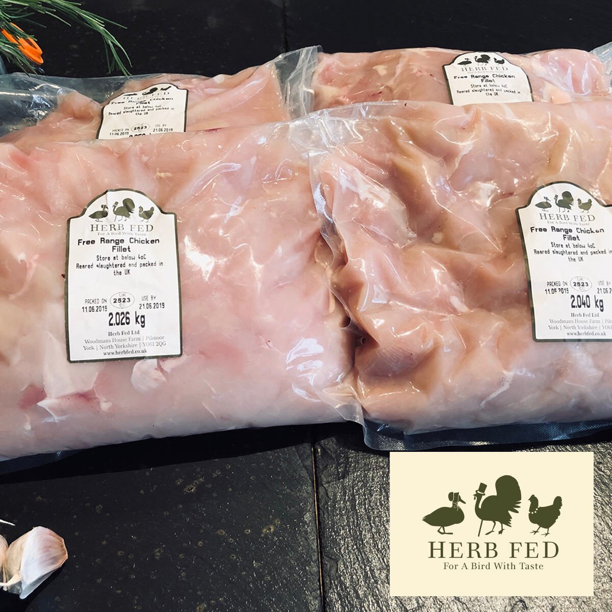 image of four packs of diced chicken