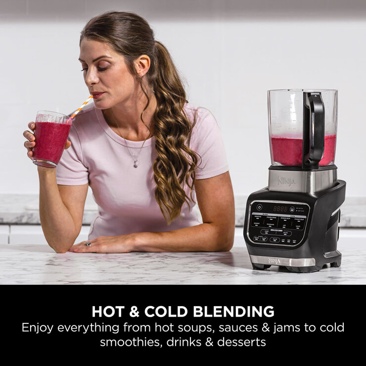 Lifestyle image of Ninja Foodi Blender & Soup Maker making smoothie