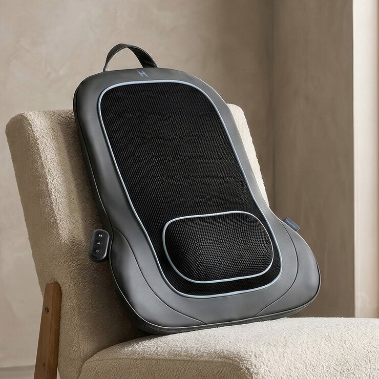 Lifestyle image of back massage cushion on a chair Lifestyle image of back massage cushion on a chair