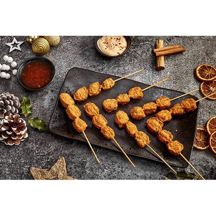 Chicken Satay sticks laid out on a plate Chicken Satay sticks laid out on a plate