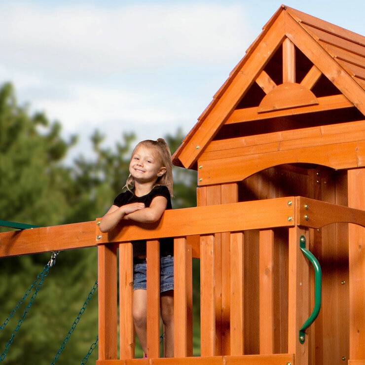 Lifestyle image of children playing on the Backyard Discovery Atlantis Swingset Playcentre