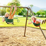 Lifestyle image showing two children on the swings Lifestyle image showing two children on the swings