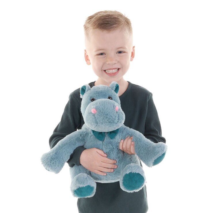 Boy Standing Holding Hippo Boy Standing Holding Hippo