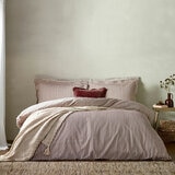 Striped duvet set with vertical burgundy and white lines, paired with matching pillowcases