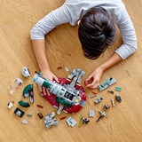 Lifestyle Image of a child playing with the Slave I 20th Anniversary lego set