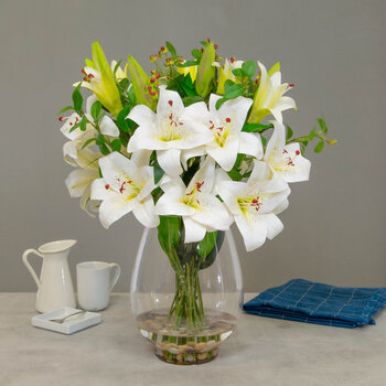 Artificial White Lilies and Mixed Foliage in Glass Vase