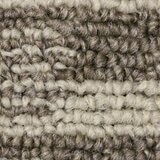 Close up of runner rug with beige and brown geometric pattern