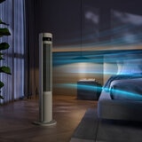 Lifestyle image of Duux Elevate Tower Fan in a bedroom