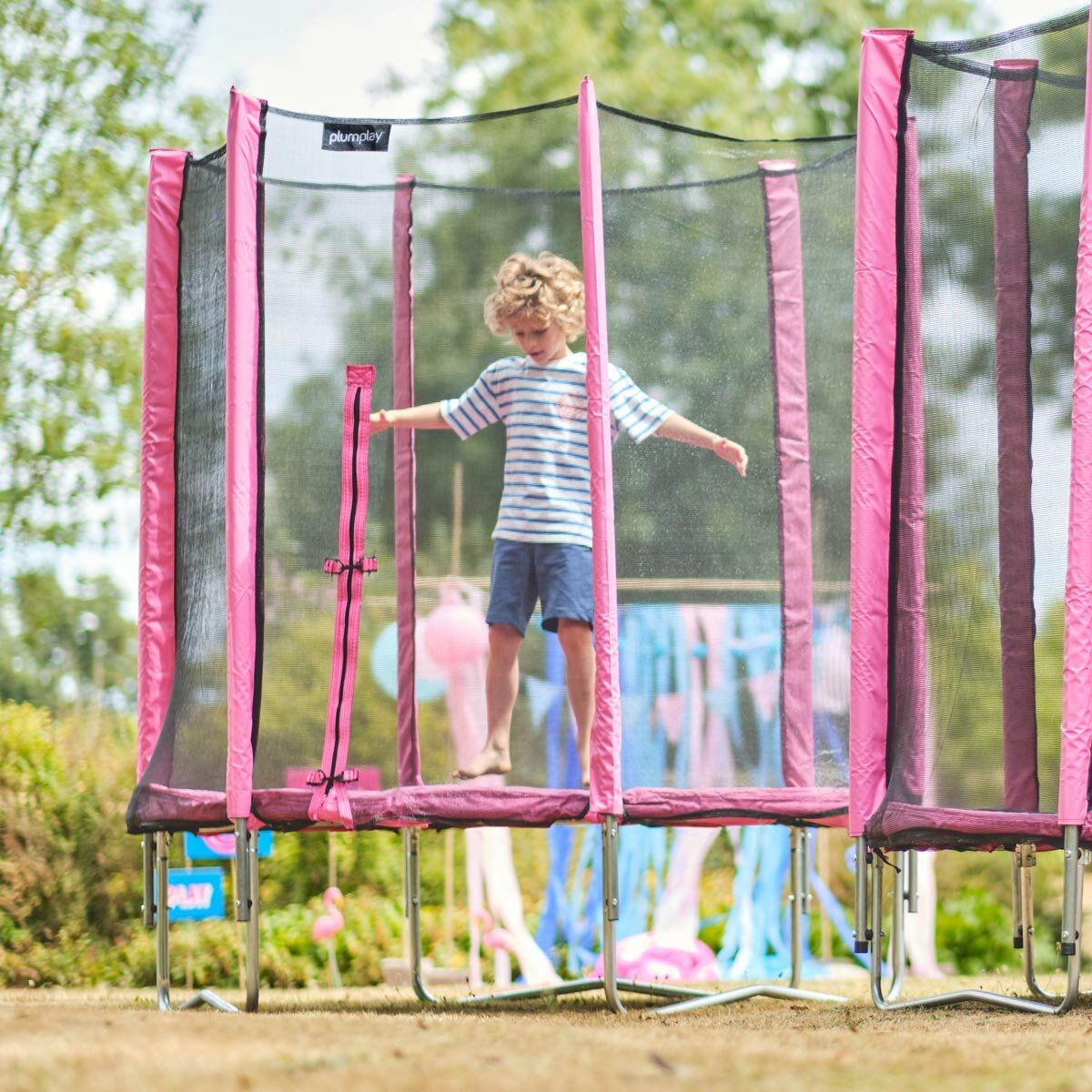 Lifestyle image of a child jumping on the trampoline