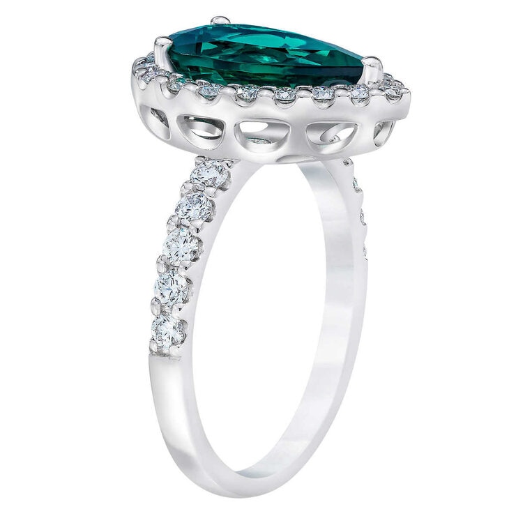 Pear Shaped Lab Emerald and 0.65ctw Diamond Ring.