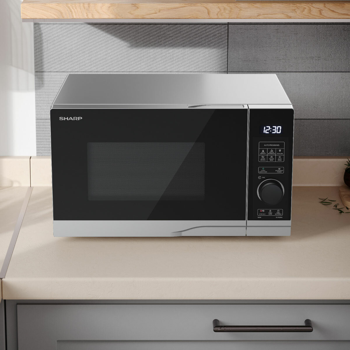 Lifestyle image of Sharp Compact 20 Litre 700W Solo Digital Microwave on kitchen tabletop Lifestyle image of Sharp Compact 20 Litre 700W Solo Digital Microwave on kitchen tabletop