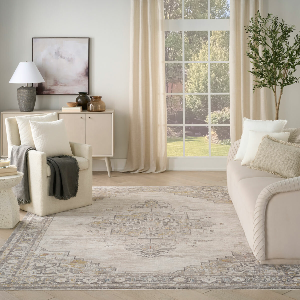 Beige and grey rug with central medallion and ornate symmetrical pattern Beige and grey rug with central medallion and ornate symmetrical pattern