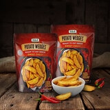 Lifestyle Image of 2 Packs with Chilli and Wedges on a Table