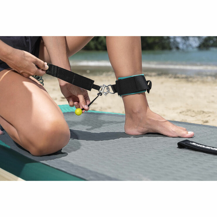 Lifestyle image of a person attaching the leash to their ankle