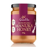 glass jar of honey with purple label