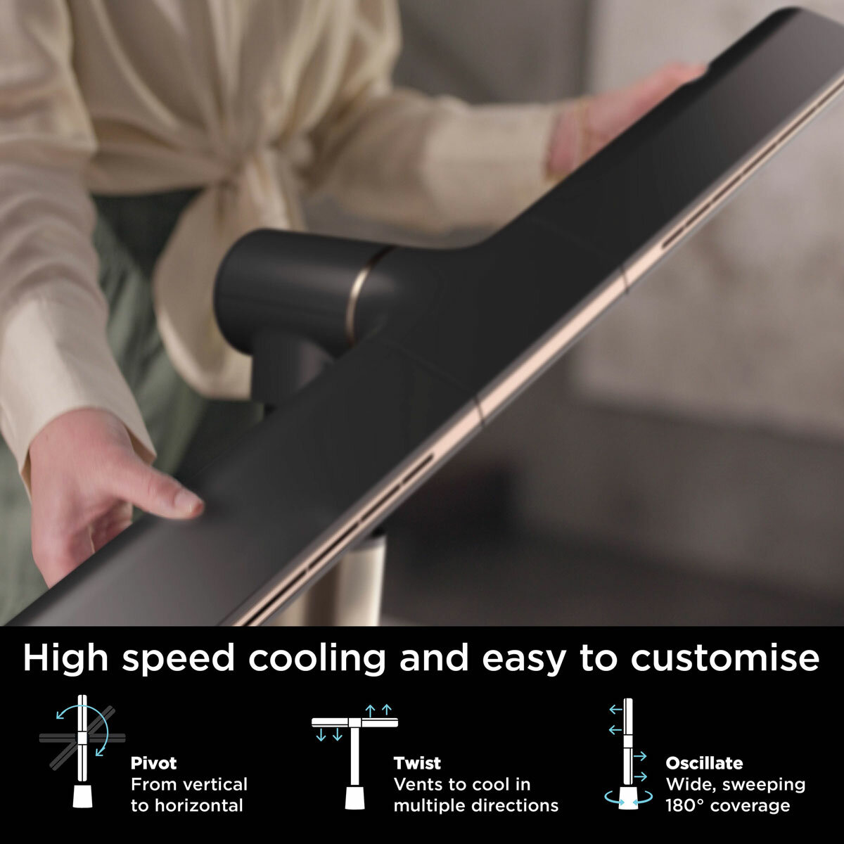 Lifestyle image of  Shark TurboBlade Multi-Directional Cooling Fan pivoting, twisting and oscillating