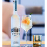Lifestyle image of vodka bottle with cocktail