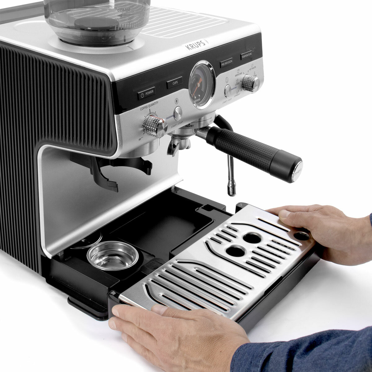 Image of Krups Precision Coffee Machine's tray being slided forward and showing storage compartment