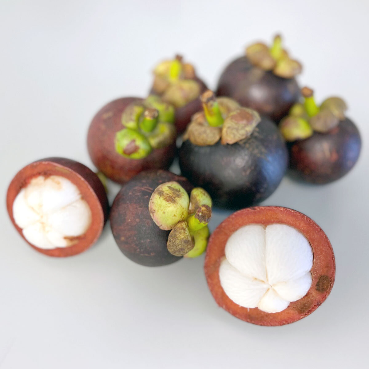 Mangosteens on a Table