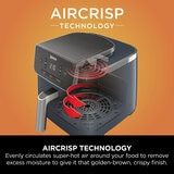 Lifestyle image with food inside the air fryer