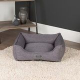 Empty pet bed in living room setting