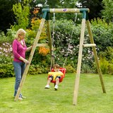 Lifestyle image of a child in the baby seat on the swing and a woman watching from the side Lifestyle image of a child in the baby seat on the swing and a woman watching from the side