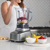Lifestyle image of Sage the Q Blender with Woman