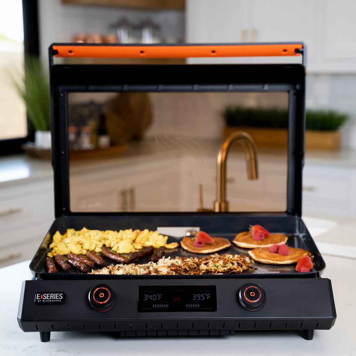 Lifestyle image of electric griddle on kitchen counter with food Lifestyle image of electric griddle on kitchen counter with food