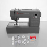 Lifestyle image of Singer Heavy Duty Sewing Machine with accesories