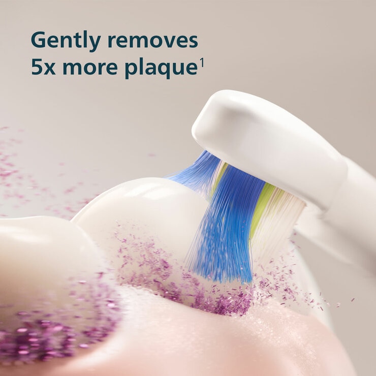 Lifestyle image of gently removing plaque