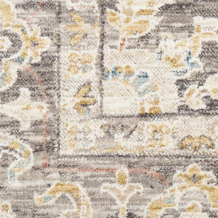 Beige and grey rug with central medallion and ornate symmetrical pattern