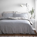Blue and white vertically striped duvet set with matching