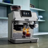Lifestyle images of De'Longhi La Specialista Touch Coffee Machine on a kitchen countertop