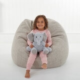 Girl Sitting Holding Elephant