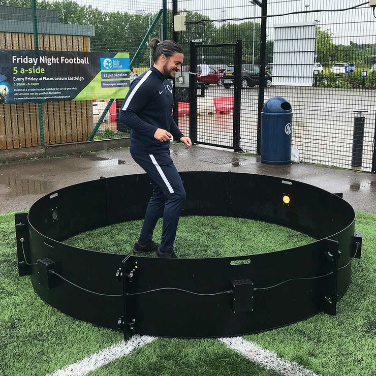 Lifestyle image of a man inside the Elite Skills ICON Fast Feet Arena