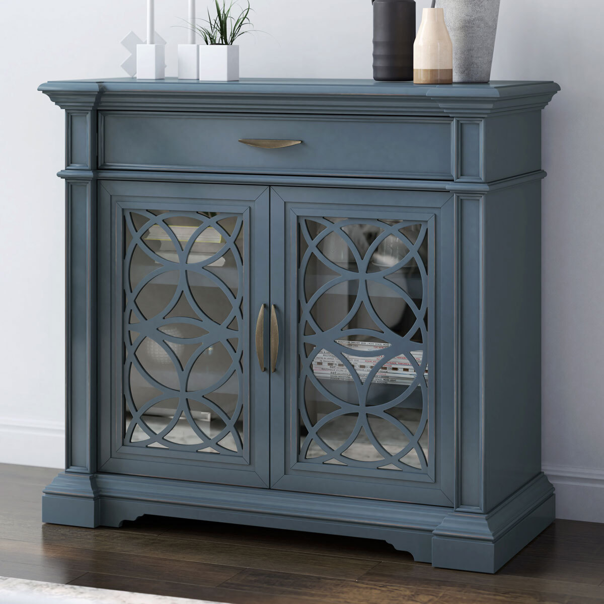 Small blue shop accent cabinet