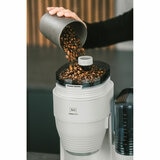 Lifestyle image of Melitta AromaFresh Gind & Brew Coffee Machine's coffee grinder